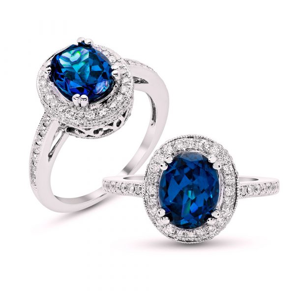 anillo de platino con zafiro azul y diamantes